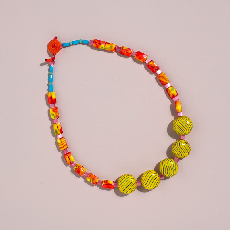 Fancy Necklace (orange +yellow swirls)